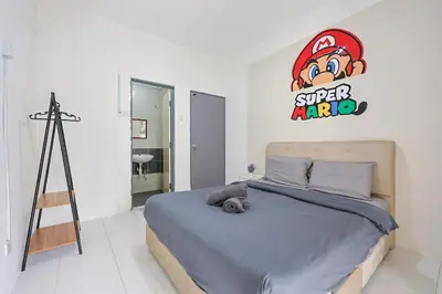a bedroom with a bed with a super mario sign on the wall at Mario Inspired Highlands Escape Family Homestay Brinchang - Clover Home 5-20 in Brinchang