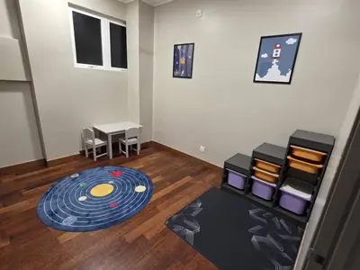 a room with a frisbee on the floor at Hejau Golf Villa in Tanah Rata