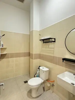 a bathroom with a toilet and a sink at 16 pax HB Homestay Raja Uda Ong Yi How Butterworth - Budget Homestay - KTV NETFLIX MAHJONG in Butterworth