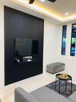 a living room with a large flat screen tv at Love birds Abbie's Private Pool Villa 2 pax in Bukit Mertajam