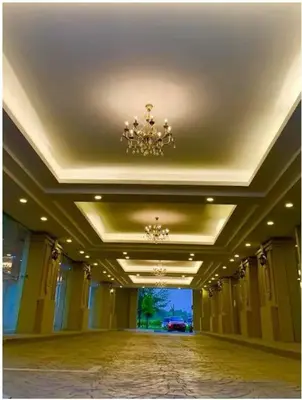 a large room with a chandelier on the ceiling at JJ's Modern Suite Kampar- Near UTAR in Kampar