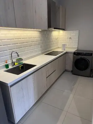a kitchen with a sink and a dishwasher at Wanderlust Retreat Studio by Iconic Regency in Bayan Lepas