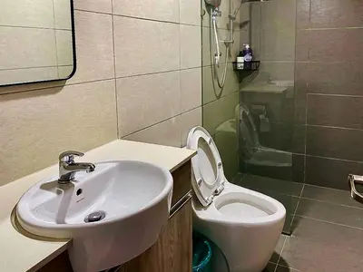 a bathroom with a sink and a toilet at #2 Hann's Residence Homestay Sunset View 2R2B in Gua Sai