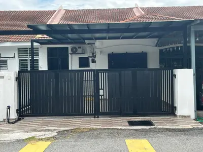 a black gate in front of a house at Saujana Number 5 in Gua Sai