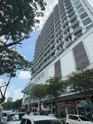 a large building with cars parked in front of it at Modern Studio The CEO Penang in Bayan Lepas