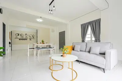 a living room with a couch and a table at Perfect for Families & Friends, Retreat Brinchang Cameron Highland- Clover Home 2-20 in Brinchang