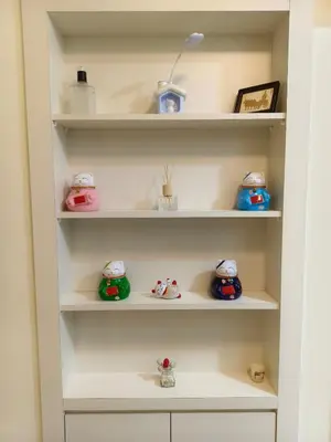a closet with shelves with toys on them at Unisuites Kampar 5 min UTAR & TARC -1 BR 3pax PetFriendly, 1 Carpark & Netflix I High Floor Unblock Mountain View in Kampar