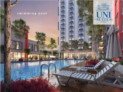 a view of a swimming pool with a table and an umbrella at Unisuites Kampar 5 min UTAR & TARC -1 BR 3pax PetFriendly, 1 Carpark & Netflix I High Floor Unblock Mountain View in Kampar