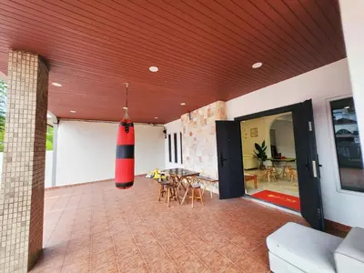 a living room with a large room with a red ceiling at Ipoh town7br5bath 25 pax pool table mahjong karaok in Ipoh