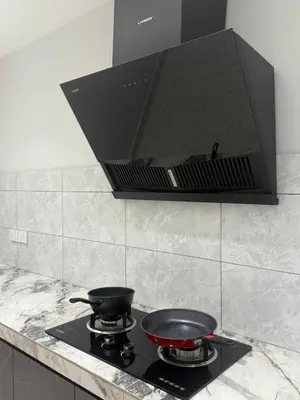 a stove with two pans on top of it at LiveLikeYourHome, RajaUda Butterworth