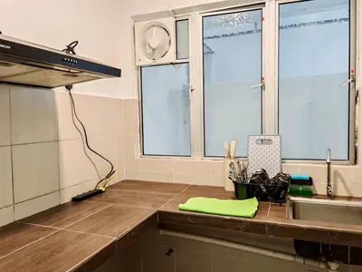 a kitchen with a sink and a counter top at DawnBlue Cameron Highlands in Brinchang