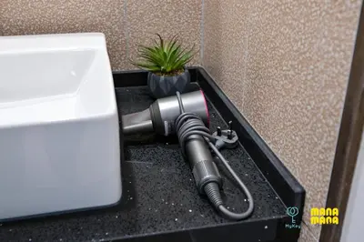 a blow dryer in a black box with a plant at Stallionz by MyKey in Ipoh