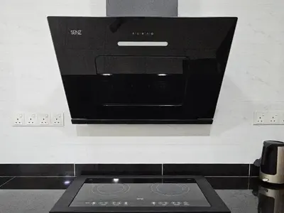 a stove top oven sitting on top of a counter at Sekinchan Family-style XL Size Homestay in Sekincan