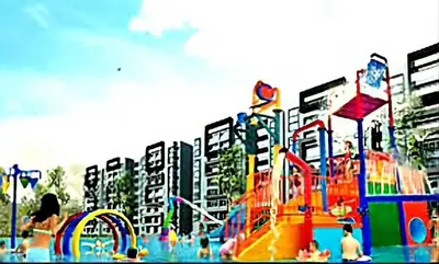 a playground with a water park with buildings in the background at Ipoh Manhattan Waterpark 3BR 8Pax Suite by City Home Empire MHA304 in Ipoh