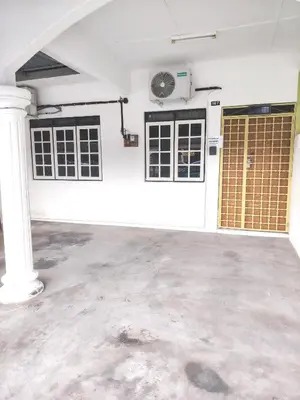 an empty garage with a fan on the wall at D'Manjung Samudera Baru HomeSTAY in Seri Manjung