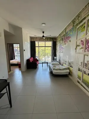 a living room with a couch and a bed at AYAAN Lavender Home at Golden Hills near Night Market in Brinchang