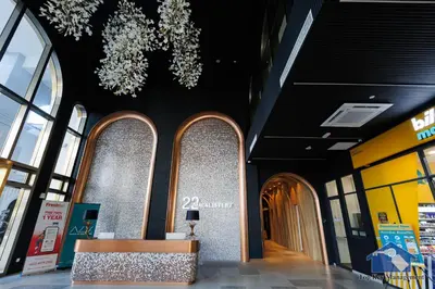 a building with a chandelier hanging from the ceiling at 22 Macalisterz in George Town