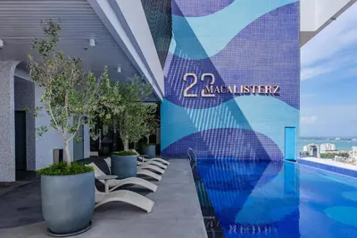 a swimming pool on the roof of a building at 22 Macalisterz in George Town