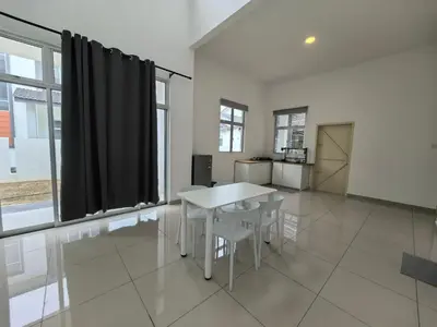 a white table and chairs in a room with windows at Family Room with Private Bathroom in Padang Serai