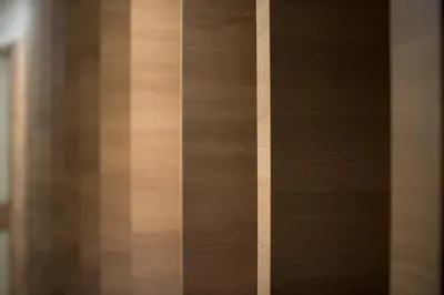 a close up of a wooden door with a pole at Mornington Hotel Waterfront Lumut in Lumut