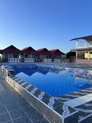 a large swimming pool with a playground in front of a building at SkyView Village Ulu Chemor in Chemor