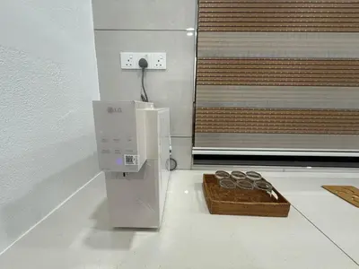 a box of chocolates on the floor in a room at Happy Guest House Taman Cowin Nibong Tebal \u5f00\u5fc3\u6c11\u5bbfTaman Cowin\u9ad8\u6e0a\u533a in Nibung Tebal