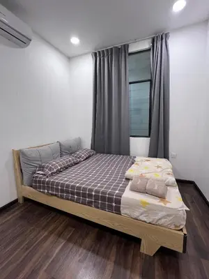 a bedroom with a bed in a room at Kuching Town Area Rex apartment in Gua Sai