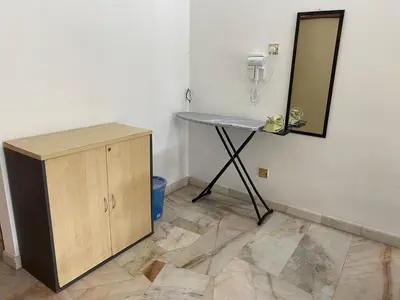 a bathroom with a sink and a mirror on the wall at Staycation Taiping Homestay in Taiping