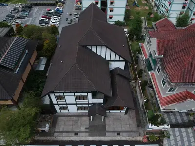 an overhead view of a house with a roof at Holiday Bungalow Guesthouse in Tanah Rata