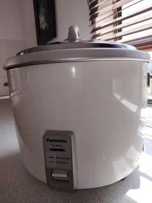 a slow cooker sitting on top of a table at Holiday Bungalow Guesthouse in Tanah Rata