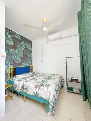 a bedroom with a bed and a ceiling fan at Cozy Private Room Teluk Intan in Teluk Intan