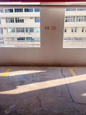 a building with the number on the side of it at Mansion one premium suite-2 bedroom in George Town