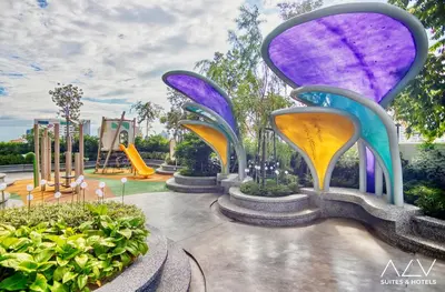 a rendering of a park with slides and a playground at 22 Macalisterz by ALV in George Town