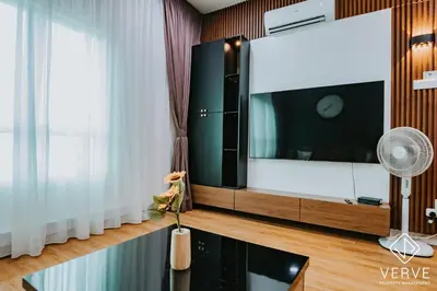 a living room with a large flat screen tv at Ipoh Residence PR1MA Kepayang 6 pax suites in Ipoh