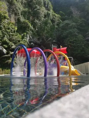 a water park with a colorful water slide at The Cove 4-7 pax in Ipoh