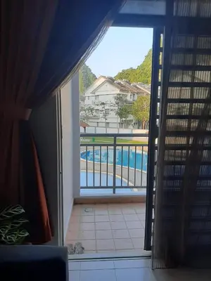 a view of a pool from a room with a window at MK Homestay Sunway in Ipoh