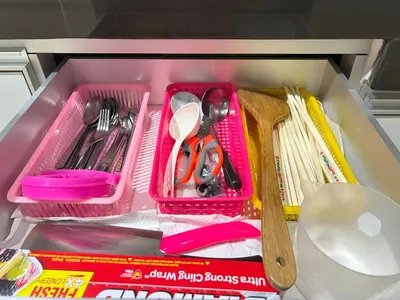 a pink drawer with scissors and other utensils at Life Art Home Family Ipoh Homestay 5R4B 18pax SY28 in Ipoh