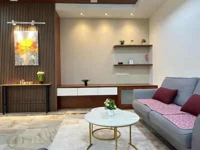 a living room with a couch and a table at Life Art Home Family Ipoh Homestay 5R4B 18pax SY28 in Ipoh