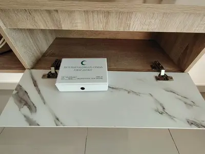 a white counter with a box on top of it at \u98ce\u4e4b\u5c45\u6c11\u5bbf Windstay in Raub
