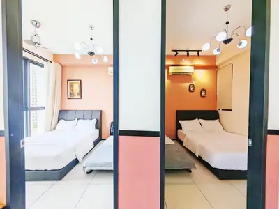 a room with two beds and a room with two beds at Georgetown 2BR Luxury Condo Unbeatable Night View Infinity Pool Attractions Food Fully Equipped#148B in Bayan Lepas