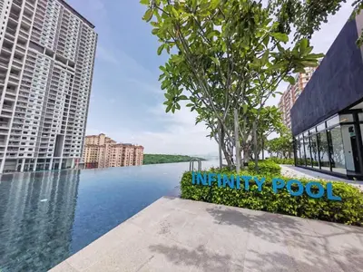 a view of the infinity pool at the infinity pool hotel at Stylish city center infinity pool unbeatable night view near to attractions, food, family friendly in Jelutong