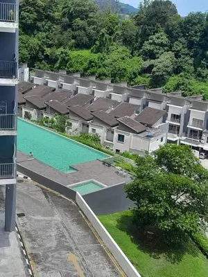 an overhead view of a building with a swimming pool at Condominium Crystal Heights in Taiping