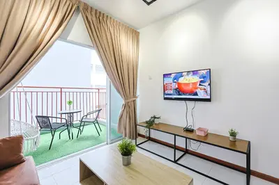 a living room with a tv and a balcony at Cloverhill Emerald Avenue Apartment Highland Brinchang Elegance Stay Clover Home 5-03 in Brinchang