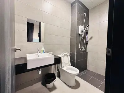 a bathroom with a sink and a toilet and a shower at 3BR-Apartment-Netflix,Cozy,Peaceful FamilyHomes b30 in George Town