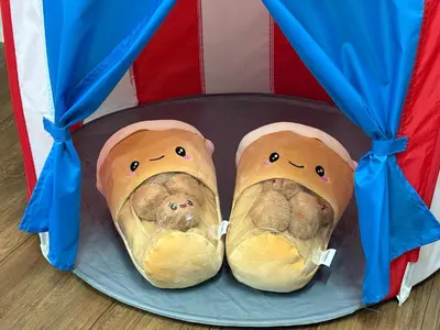 two rolls with faces on them on a plate at Bondfire Ipoh Bercham Karaoke & Homestay 5pax in Ipoh