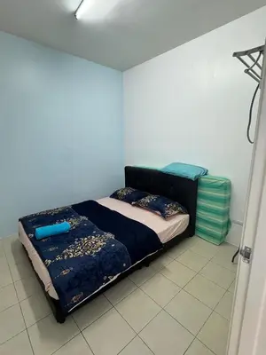 a bedroom with a bed in a room at AYAAN Fifa Game HOMESTAY At Tanah Rata with Wifi in Tanah Rata
