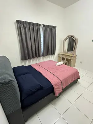 a bedroom with a bed and a window and a chair at Ayaan Gaming Home 2 Experience Real Life Simulator Racing Games in Tanah Rata