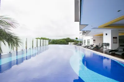 an empty swimming pool in a building at Simple Bali l Projector l Netflix l 2 parking in Ipoh