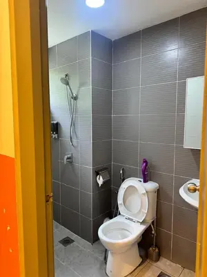 a bathroom with a toilet and a shower at Ayaan Snookers House 2 at Quintet Cameron Highland in Tanah Rata