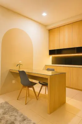 a kitchen with a wooden table and two chairs at 2 Connecting Room, Riverine Diamond, 5A & 5B in Gua Sai